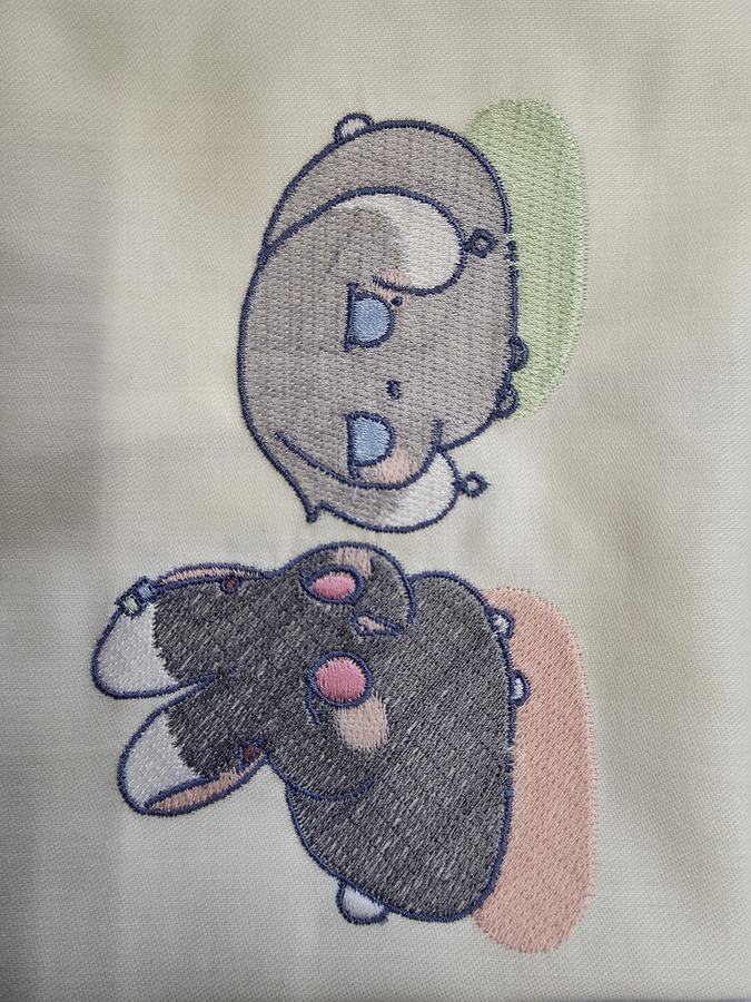 Jean  Machine embroidery of japanese characters, created for her daughter